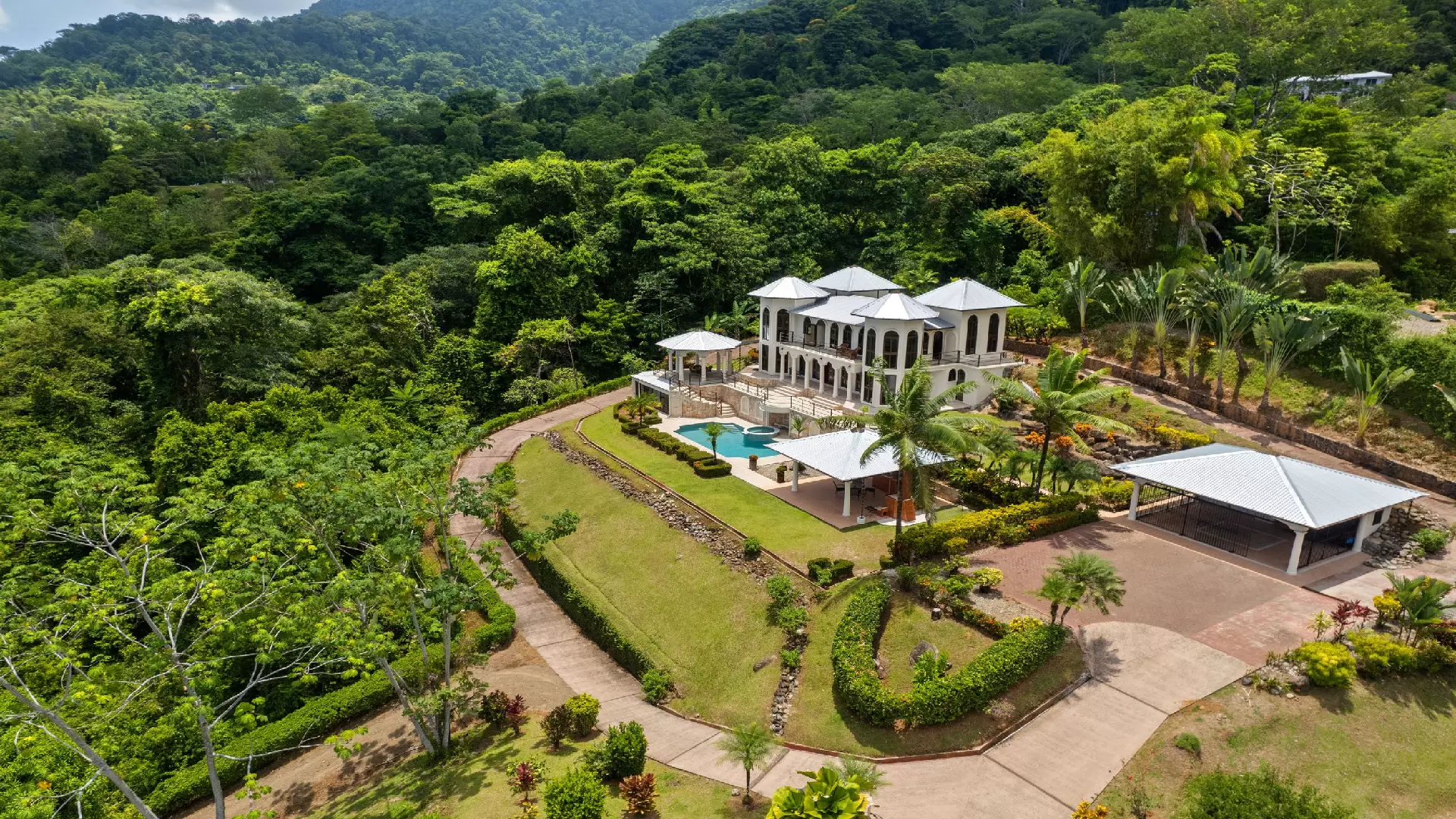 Ojochal Ocean View Estate Home with Guest Bungalow, Caretaker Home, Fruit Trees, and Waterfall